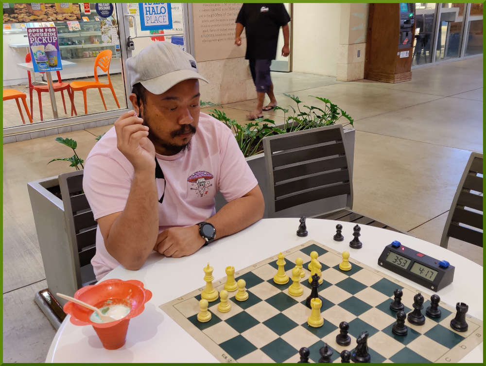 May 4th, 2021. Jeremy playing chess at Ka Makana Alii.