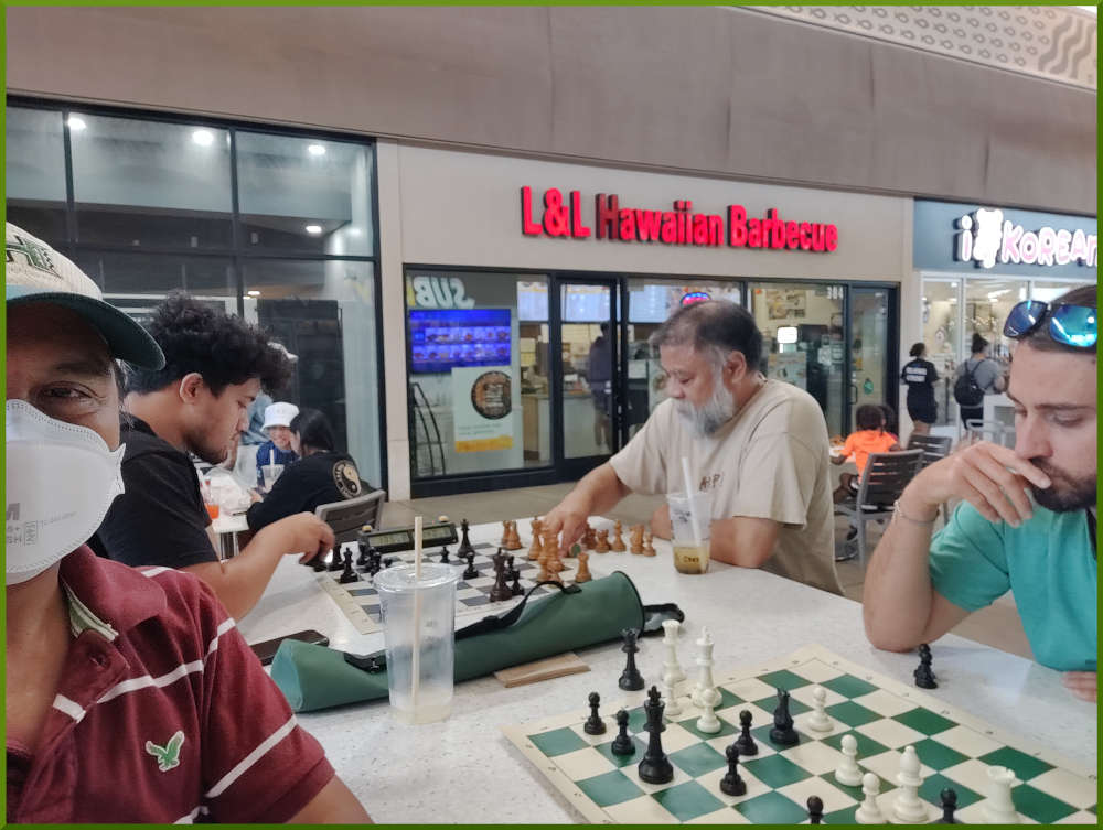 June 21st, 2022. Ka Makana Alii chess meetup. Ray vs Ari (near board). Christian vs Chet (far board).