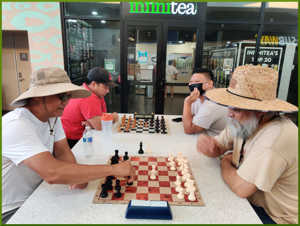 August 16th, 2022. Ka Makana Alii chess meetup. Edgar vs Chet (near board). Ceazar vs Prince (far board).