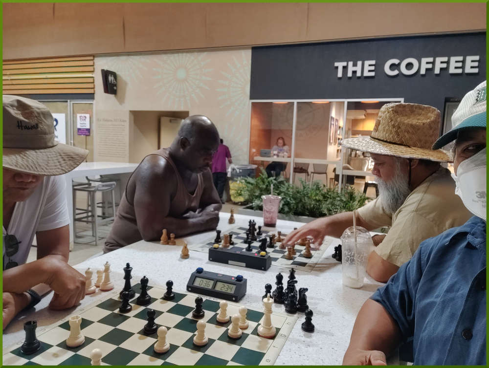 September 13th, 2022. Ka Makana Alii chess meetup. Edgar vs Ray (near board). Ramon vs Chet (far board).