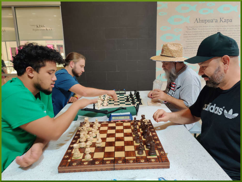 November 8th, 2022. Ka Makana Alii chess meetup. Christian vs Rick (near board). Ari vs Chet (far board).